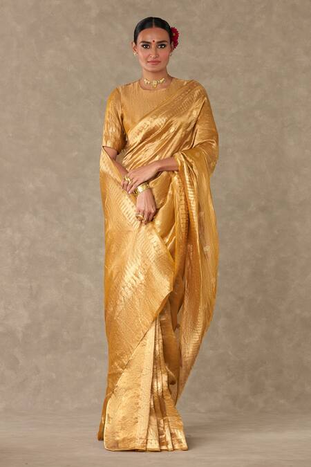 Masaba Gold Tissue Zari Sunehri Saree With Unstitched Blouse Piece at Aza Fashions Masaba_Gold Tissue Zari Sunehri Saree With Unstitched Blouse Piece_at_Aza_Fashions