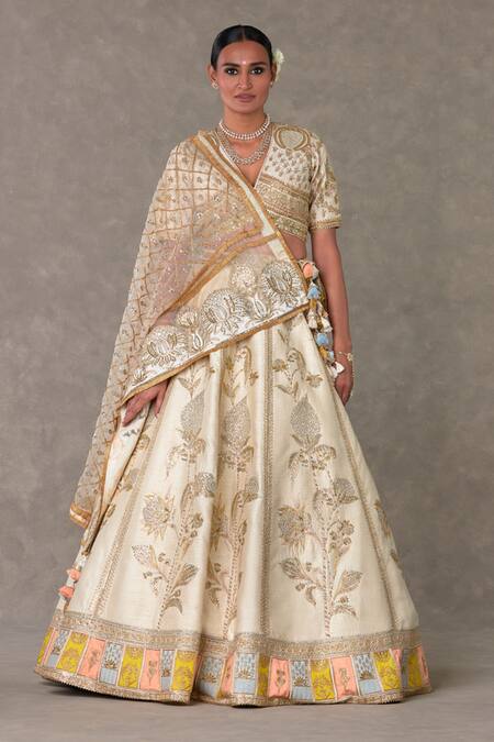 Buy Masaba Ivory Dupatta Organza, Lehenga And Blouse Raw Anar Phool Embroidered Bridal Set at Aza Fashions Buy_Masaba_Ivory Dupatta Organza, Lehenga And Blouse Raw Anar Phool Embroidered Bridal Set_at_Aza_Fashions