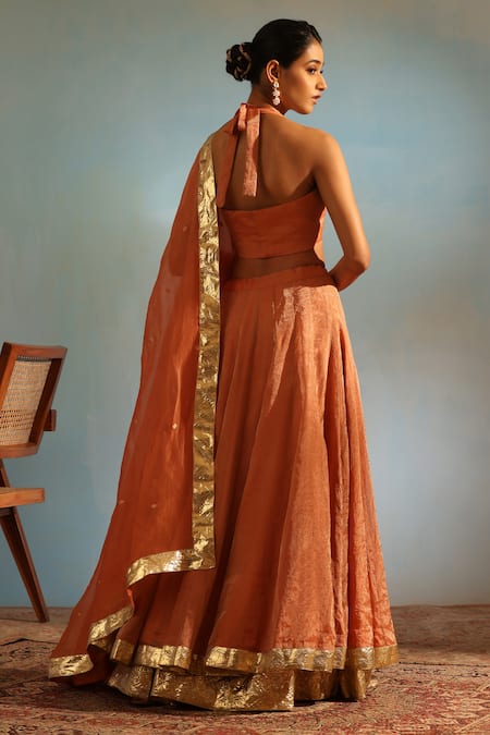 Shop_Weaver Story_Orange Tissue, Silk Embroidery, Lace V-neck Lehenga Sleeveless Blouse Set _at_Aza_Fashions