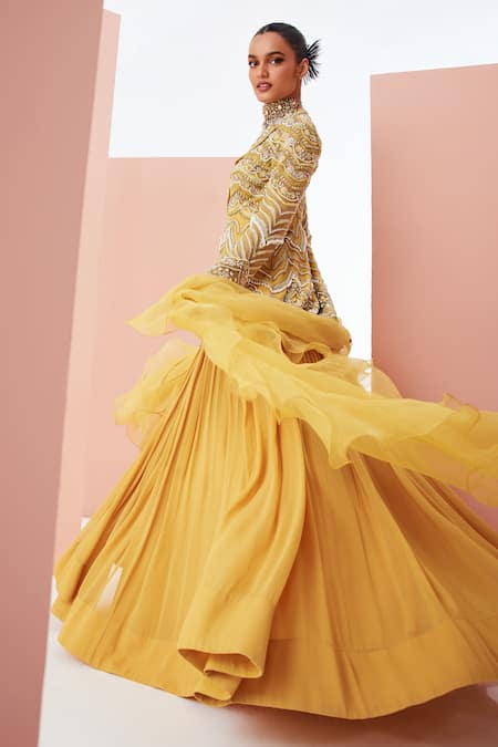 Shop_Awigna_Yellow Net, Georgette Cut Work, Pearls, Sequins, Peplum Jacket Lehenga Set_at_Aza_Fashions