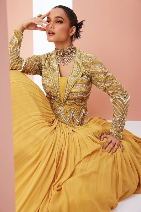 Shop_Awigna_Yellow Net, Georgette Cut Work, Pearls, Sequins, Peplum Jacket Lehenga Set_Online_at_Aza_Fashions
