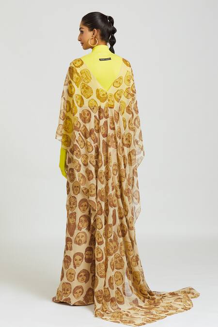 Shop Huemn Beige Silk, Georgette V-neck Face Mania Print Pant Saree at Aza Fashions Shop_Huemn_Beige Silk, Georgette V-neck Face Mania Print Pant Saree _at_Aza_Fashions