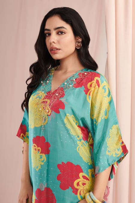 Negra Elegante Blue Crepe Pearls V-neck Blossom Print Kaftan With Pant at Aza Fashions Negra Elegante_Blue Crepe Pearls V-neck Blossom Print Kaftan With Pant _at_Aza_Fashions