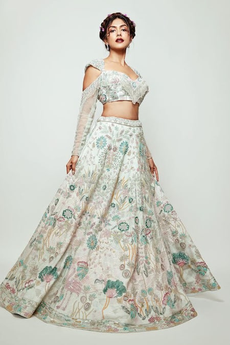 Jigar & Nikita Ivory Net Embroidery Floral Sweetheart Neck Blouse And Bridal Lehenga Set 