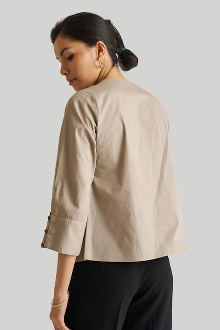 Shop Reistor Beige Cotton V-neck Organic Twisted Top at Aza Fashions Shop_Reistor_Beige Cotton V-neck Organic Twisted Top _at_Aza_Fashions