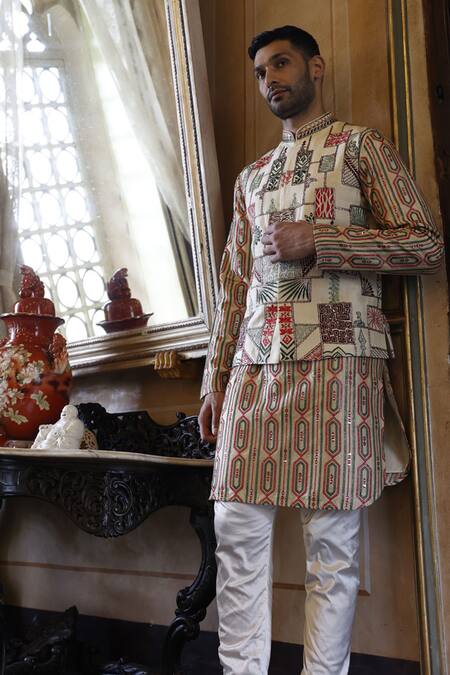 Vikram Phadnis Ivory Bundi And Kurta Silk Embroidery Thread Abstract & Set Online at Aza Fashions Vikram Phadnis_Ivory Bundi And Kurta Silk Embroidery Thread Abstract & Set _Online_at_Aza_Fashions