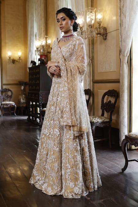 Shop Vikram Phadnis Beige Net Embroidery Cut Dana V Neck Blossom Bridal Lehenga Set at Aza Fashions Shop_Vikram Phadnis_Beige Net Embroidery Cut Dana V Neck Blossom Bridal Lehenga Set _at_Aza_Fashions