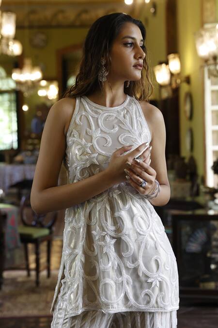 Vikram Phadnis Ivory Net Embroidery Cut Dana Halter Neck Gardenia Bloom Top With Pant Online at Aza Fashions Vikram Phadnis_Ivory Net Embroidery Cut Dana Halter Neck Gardenia Bloom Top With Pant _Online_at_Aza_Fashions