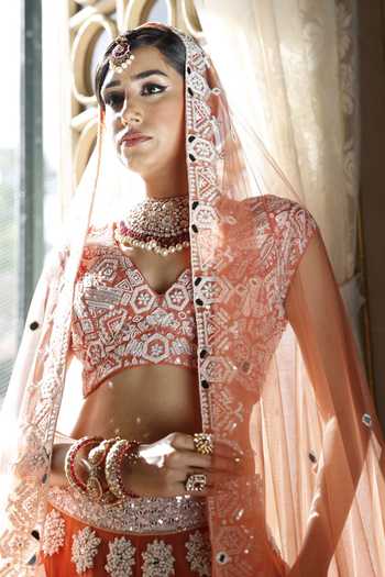 Buy Vikram Phadnis Peach Net Embroidery Beads V Neck Geometric Flora Art Bridal Lehenga Set Buy_Vikram Phadnis_Peach Net Embroidery Beads V Neck Geometric Flora Art Bridal Lehenga Set