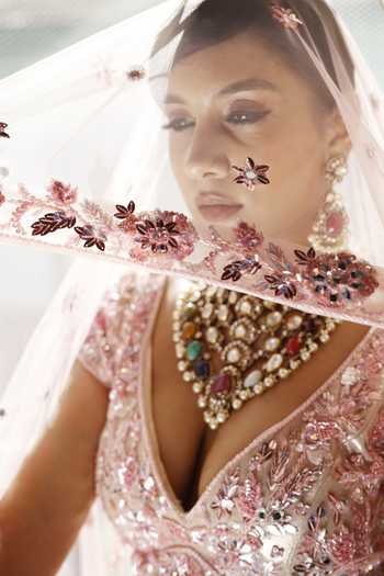 Vikram Phadnis_Pink Net Embroidery Beads Sweetheart Neck Peony Bloom Bridal Lehenga Set _Online_at_Aza_Fashions