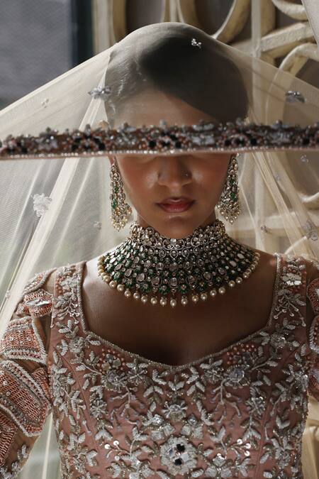 Vikram Phadnis Beige Net Embroidery Sweetheart Neck Flora Blossom Bridal Lehenga Set at Aza Fashions Vikram Phadnis_Beige Net Embroidery Sweetheart Neck Flora Blossom Bridal Lehenga Set _at_Aza_Fashions