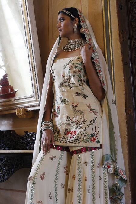 Vikram Phadnis Ivory Peplum Kurta New Raw Silk Embroidered Broad U Sharara Set Online at Aza Fashions Vikram Phadnis_Ivory Peplum Kurta New Raw Silk Embroidered Broad U Sharara Set _Online_at_Aza_Fashions