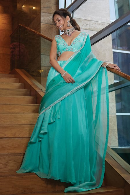 ISHA GUPTA TAYAL_Green Satin, Organza, Georgette Sequins, Cut Aqua Embroidered Lehenga Saree Set _at_Aza_Fashions