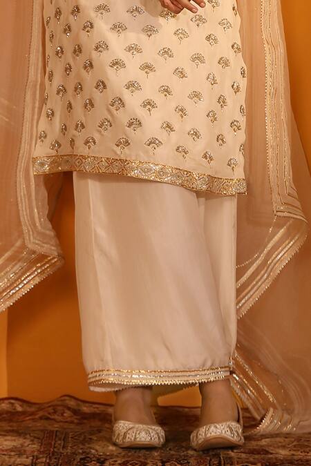 Sitaraa Ivory Organza, Silk Sequins, Gota Roop Floral Embroidered Kurta Palazzo Set Online at Aza Fashions Sitaraa_Ivory Organza, Silk Sequins, Gota Roop Floral Embroidered Kurta Palazzo Set _Online_at_Aza_Fashions