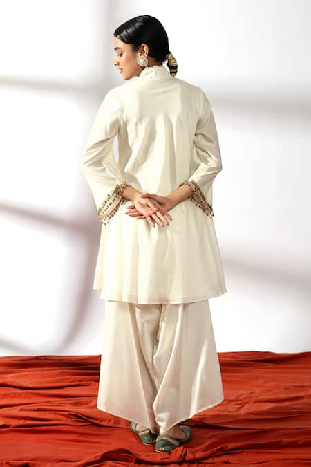 Shop Leela By A Ivory Chanderi, Linen Zari, Sequins Flora Embroidered Kurta With Palazzo at Aza Fashions Shop_Leela By A_Ivory Chanderi, Linen Zari, Sequins Flora Embroidered Kurta With Palazzo _at_Aza_Fashions
