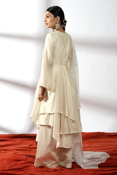 Shop Leela By A Ivory Chanderi, Organza, Linen Sequins Round Ghungroo Embellished Anarkali Set at Aza Fashions Shop_Leela By A_Ivory Chanderi, Organza, Linen Sequins Round Ghungroo Embellished Anarkali Set _at_Aza_Fashions