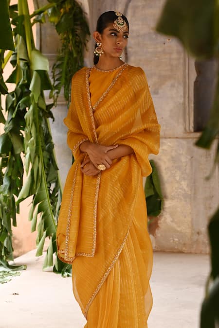 Deep Thee_Yellow Silk, Organza Zari, Sequins Halter Neck Striped Saree With Blouse _at_Aza_Fashions