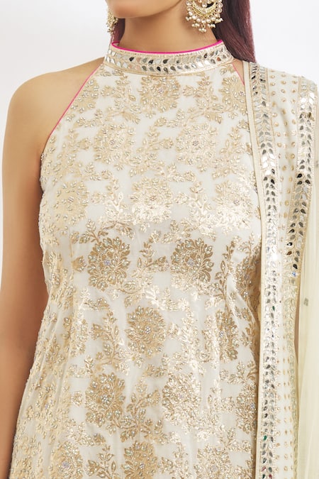 Shop_Vandana Sethi_Ivory Chanderi Smocking, Stones High Neck, Floral Pattern Kurta Gharara Set _Online_at_Aza_Fashions