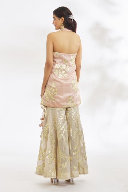 Shop Vandana Sethi Peach Organza, Net Embroidery, Gota Patti Halter Neck Floral Kurta Gharara Set at Aza Fashions Shop_Vandana Sethi_Peach Organza, Net Embroidery, Gota Patti Halter Neck Floral Kurta Gharara Set _at_Aza_Fashions