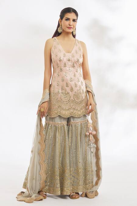 Shop Vandana Sethi Peach Organza, Net Mirrors, Gota Patti V-neck Embroidered Kurta Gharara Set Online at Aza Fashions Shop_Vandana Sethi_Peach Organza, Net Mirrors, Gota Patti V-neck Embroidered Kurta Gharara Set _Online_at_Aza_Fashions