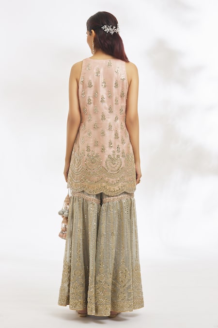 Shop Vandana Sethi Peach Organza, Net Mirrors, Gota Patti V-neck Embroidered Kurta Gharara Set at Aza Fashions Shop_Vandana Sethi_Peach Organza, Net Mirrors, Gota Patti V-neck Embroidered Kurta Gharara Set _at_Aza_Fashions
