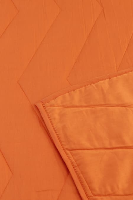 Shop_House This_Orange Cotton Satin Karanji Chevron Quilted Bedcover_Online_at_Aza_Fashions