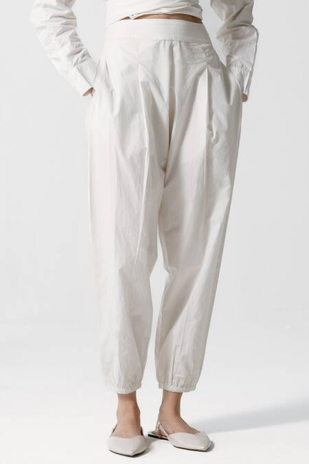 OFRIDA_White Cotton Plain Jogger Pant_Online_at_Aza_Fashions