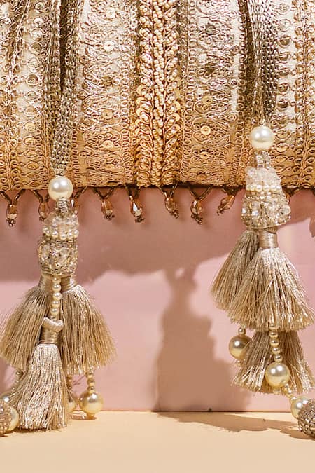 Shop_Amyra_Gold Pearls, Zari, Embroidery Naaz Thread Potli _Online_at_Aza_Fashions