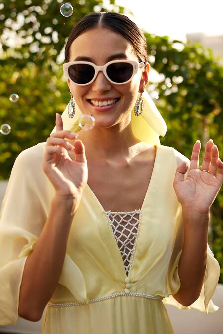 Parshya_Yellow Viscose, Georgette, Satin Pearls V-neck Cape Sleeves Maxi Gown _Online_at_Aza_Fashions