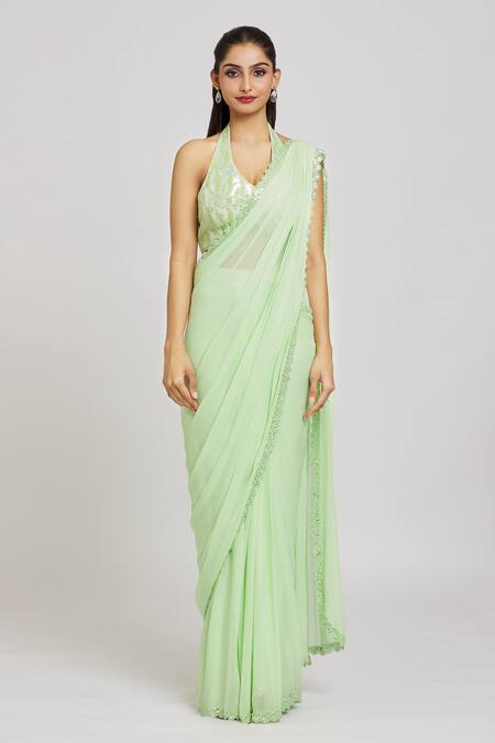 Nitisha Kashyap Official_Green Silk, Georgette, Organza Sequins, Embroidered Border Saree With Blouse _Online_at_Aza_Fashions