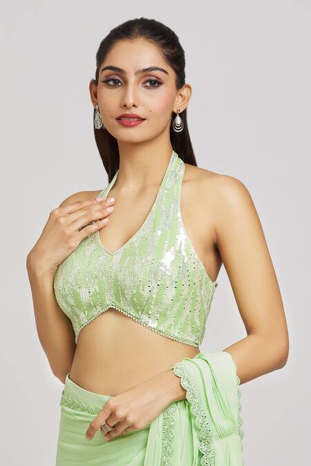 Nitisha Kashyap Official_Green Silk, Georgette, Organza Sequins, Embroidered Border Saree With Blouse _at_Aza_Fashions