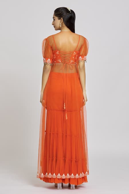 Shop Nitisha Kashyap Official Orange Silk, Net, Georgette Beads, Tassels Embroidered Long Cape Gharara Set at Aza Fashions Shop_Nitisha Kashyap Official_Orange Silk, Net, Georgette Beads, Tassels Embroidered Long Cape Gharara Set _at_Aza_Fashions