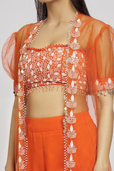 Shop Nitisha Kashyap Official Orange Silk, Net, Georgette Beads, Tassels Embroidered Long Cape Gharara Set Online at Aza Fashions Shop_Nitisha Kashyap Official_Orange Silk, Net, Georgette Beads, Tassels Embroidered Long Cape Gharara Set _Online_at_Aza_Fashions