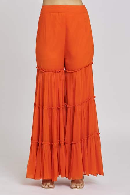 Nitisha Kashyap Official Orange Silk, Net, Georgette Beads, Tassels Embroidered Long Cape Gharara Set at Aza Fashions Nitisha Kashyap Official_Orange Silk, Net, Georgette Beads, Tassels Embroidered Long Cape Gharara Set _at_Aza_Fashions