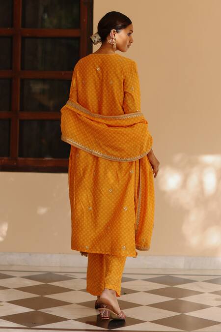 Shop Avacara Yellow Chanderi Print Hand Block Notched Neck Straight Kurta Pant Set at Aza Fashions Shop_Avacara_Yellow Chanderi Print Hand Block Notched Neck Straight Kurta Pant Set _at_Aza_Fashions