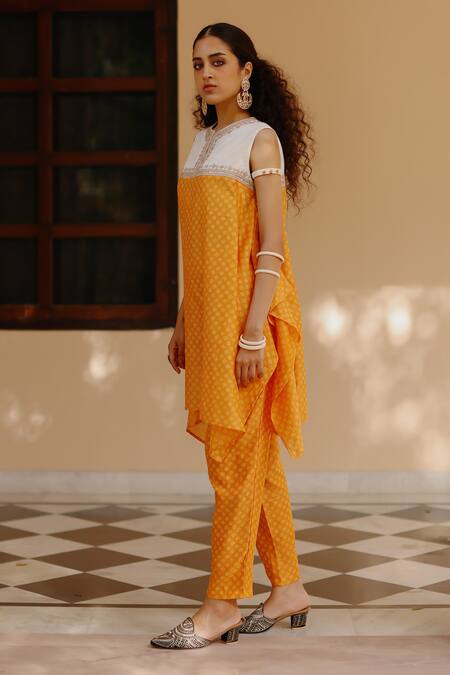 Buy Avacara Yellow Chanderi Print Hand Block Round Asymmetric Kurta With Pant Online at Aza Fashions Buy_Avacara_Yellow Chanderi Print Hand Block Round Asymmetric Kurta With Pant _Online_at_Aza_Fashions