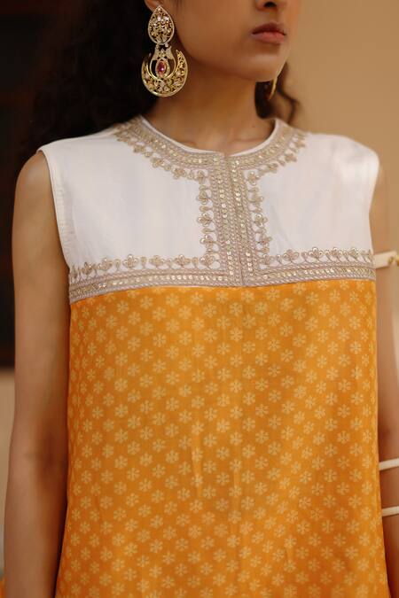 Shop Avacara Yellow Chanderi Print Hand Block Round Asymmetric Kurta With Pant Online at Aza Fashions Shop_Avacara_Yellow Chanderi Print Hand Block Round Asymmetric Kurta With Pant _Online_at_Aza_Fashions