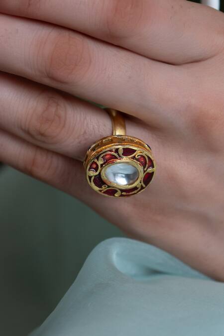 Buy Do Taara Red Imitation Diamonds Oblong Carved Work Ring Online at Aza Fashions Buy_Do Taara_Red Imitation Diamonds Oblong Carved Work Ring _Online_at_Aza_Fashions