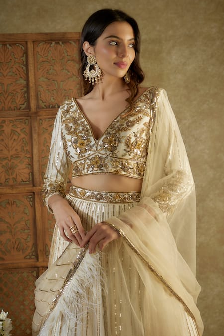 Buy Mehak Murpana Ivory Net Sequins, Cut Work, Feathers V-neck Embroidered Bridal Lehenga Set Online at Aza Fashions Buy_Mehak Murpana_Ivory Net Sequins, Cut Work, Feathers V-neck Embroidered Bridal Lehenga Set _Online_at_Aza_Fashions