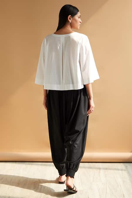 Shop House Of Manaa White Cotton Round Neck Solid Poncho Top And Harem Pant Set at Aza Fashions Shop_House Of Manaa_White Cotton Round Neck Solid Poncho Top And Harem Pant Set _at_Aza_Fashions