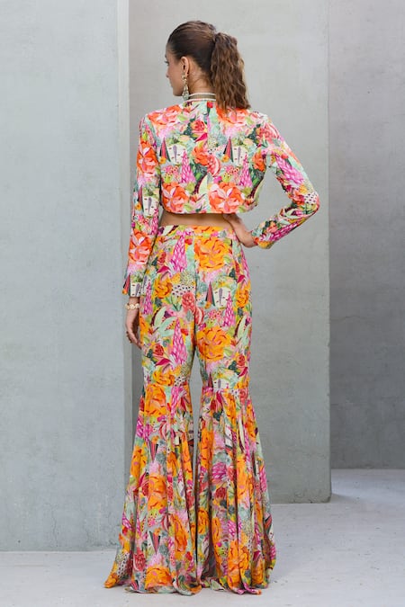 Shop Rishi and Vibhuti Multi Color Crepe Sequins, Pearls Tropical Bloom Printed Jacket Flared Pant Set at Aza Fashions Shop_Rishi and Vibhuti_Multi Color Crepe Sequins, Pearls Tropical Bloom Printed Jacket Flared Pant Set _at_Aza_Fashions