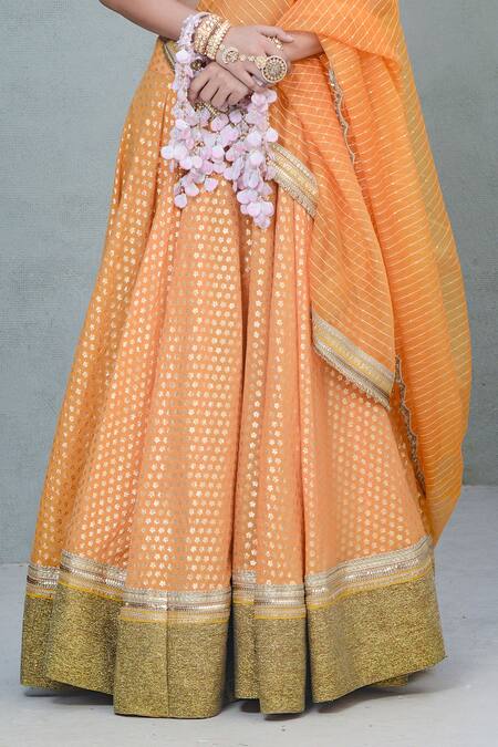 Rishi and Vibhuti_Orange Chanderi, Organza Sequins, Mira Floral Foil Pattern Lehenga Set _Online_at_Aza_Fashions