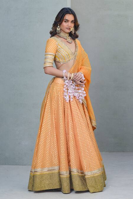 Buy_Rishi and Vibhuti_Orange Chanderi, Organza Sequins, Mira Floral Foil Pattern Lehenga Set _Online_at_Aza_Fashions