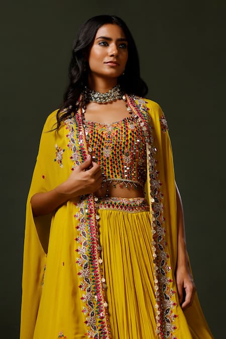 Two Sisters By Gyans Yellow Georgette Crystals, Mirrors, Nimbu Mirchi Embellished Cape Lehenga Set Online at Aza Fashions Two Sisters By Gyans_Yellow Georgette Crystals, Mirrors, Nimbu Mirchi Embellished Cape Lehenga Set _Online_at_Aza_Fashions