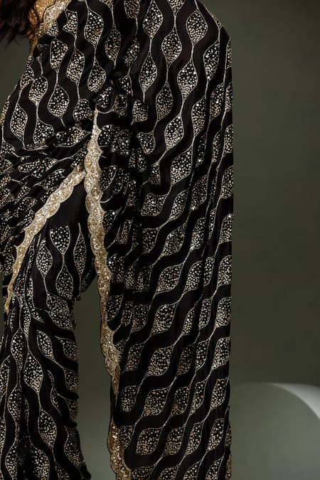 Two Sisters By Gyans Black Chiffon Sequins Wave Embellished Saree With Unstitched Blouse Piece Online at Aza Fashions Two Sisters By Gyans_Black Chiffon Sequins Wave Embellished Saree With Unstitched Blouse Piece _Online_at_Aza_Fashions