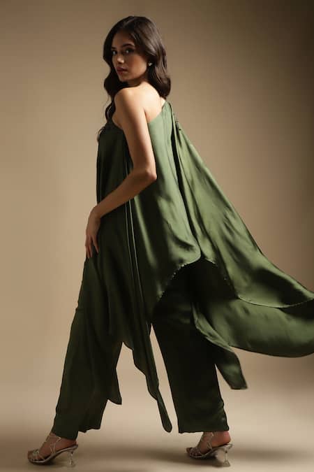 Shop Sakshi Khetterpal Green Silk Crystals, Cut Work, Sequins, Neckline Embroidered Top And Pant Set at Aza Fashions Shop_Sakshi Khetterpal_Green Silk Crystals, Cut Work, Sequins, Neckline Embroidered Top And Pant Set _at_Aza_Fashions