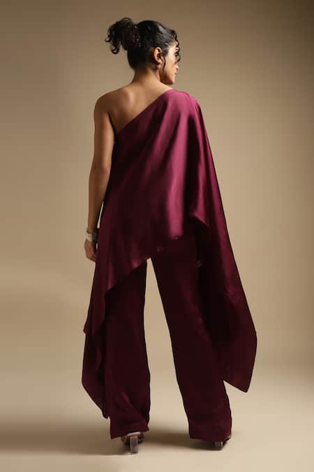 Shop Sakshi Khetterpal Wine Silk, Cotton Sequins, Cut One Shoulder Neckline Embroidered Top And Pant Set at Aza Fashions Shop_Sakshi Khetterpal_Wine Silk, Cotton Sequins, Cut One Shoulder Neckline Embroidered Top And Pant Set _at_Aza_Fashions