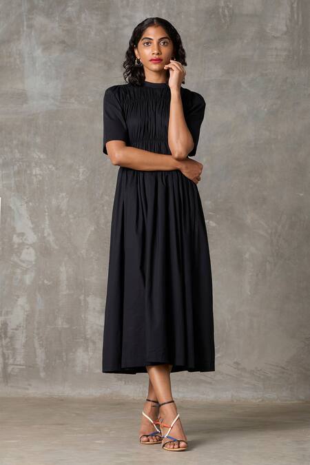 The Summer House_Black Cotton Round Neck Mo Solid Dress With Slip_at_Aza_Fashions