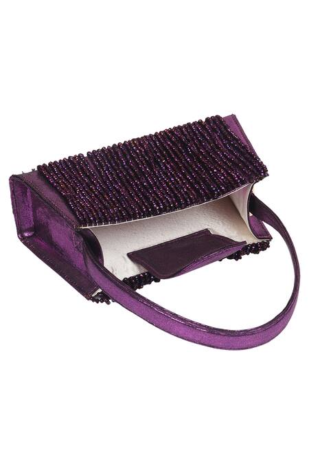 Shop_X Feet Above_Wine Beads Embellished Tassel Handbag _Online_at_Aza_Fashions