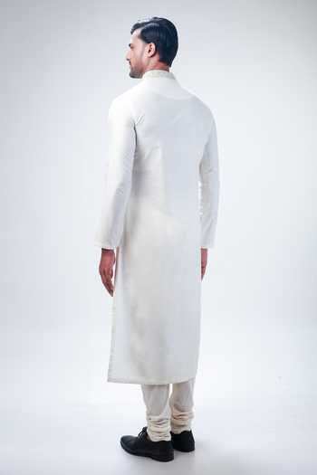 Shop Kommal Sood Off White Raw Silk Embroidery Floral Sherwani Churidar Set at Aza Fashions Shop_Kommal Sood_Off White Raw Silk Embroidery Floral Sherwani Churidar Set _at_Aza_Fashions